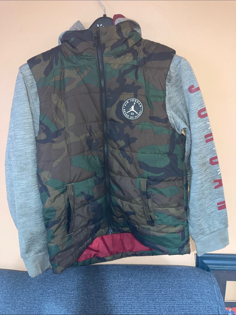 Jordan Green Camo Puffer Jacket with Gray Sleeves and Red Accent